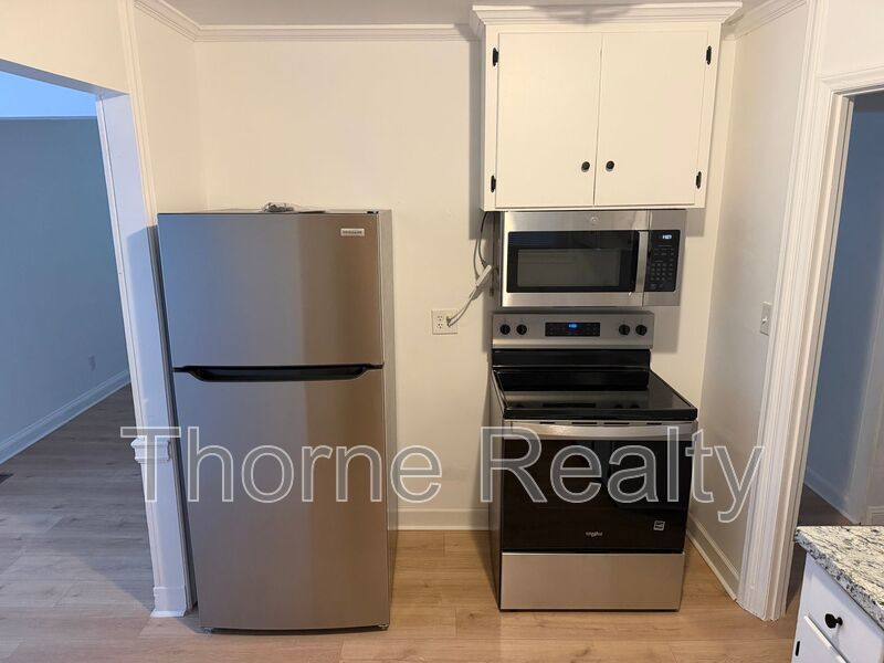 Updated 3 bedroom home with large front porch property image