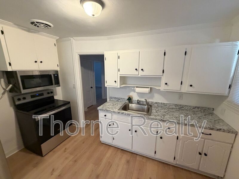 Updated 3 bedroom home with large front porch property image