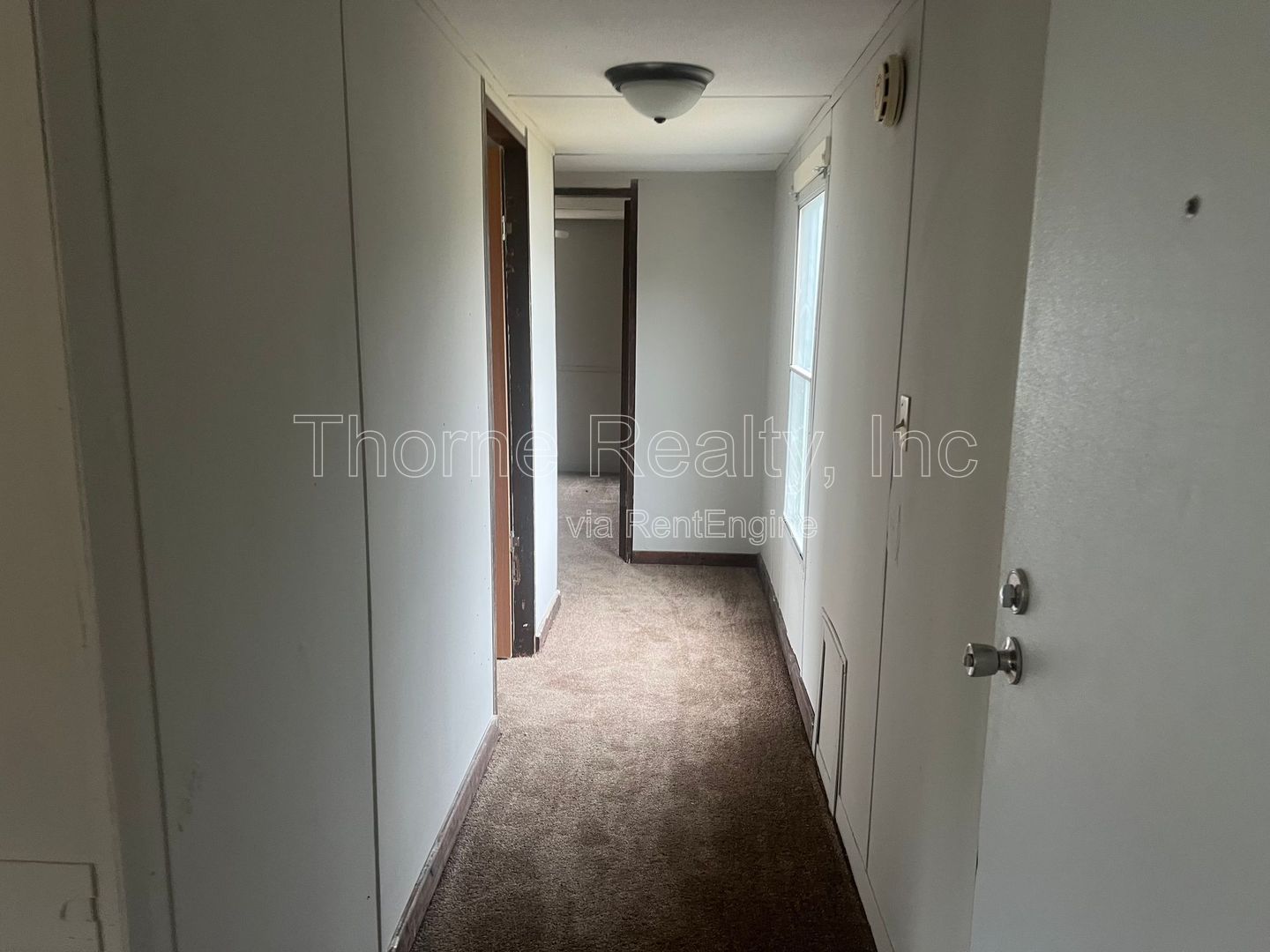 Singlewide in Hilltop MHP with New Carpet property image