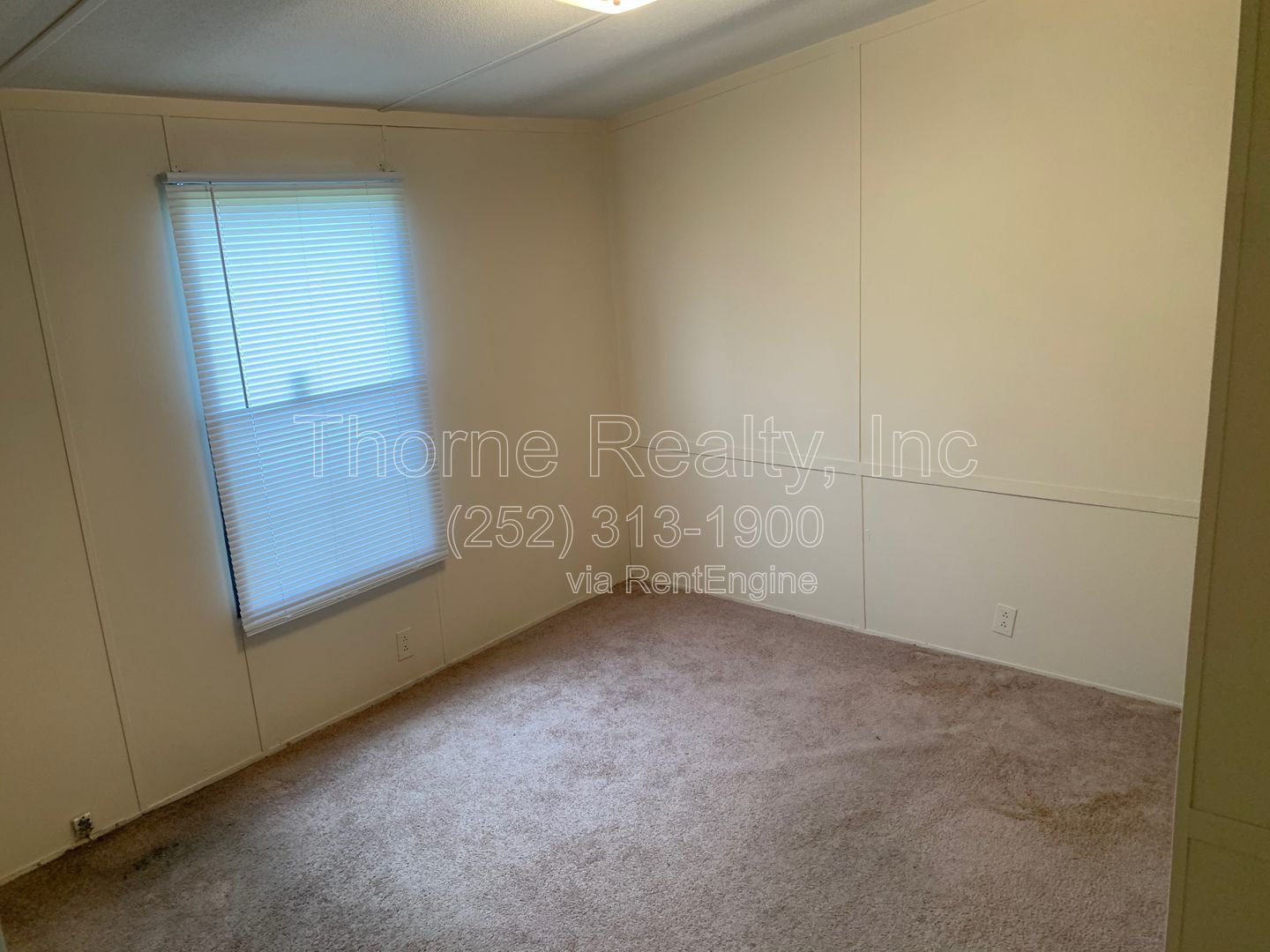 Doublewide Mobile Home on Large Corner Lot property image